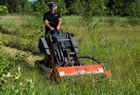 mowing with skidsteer 